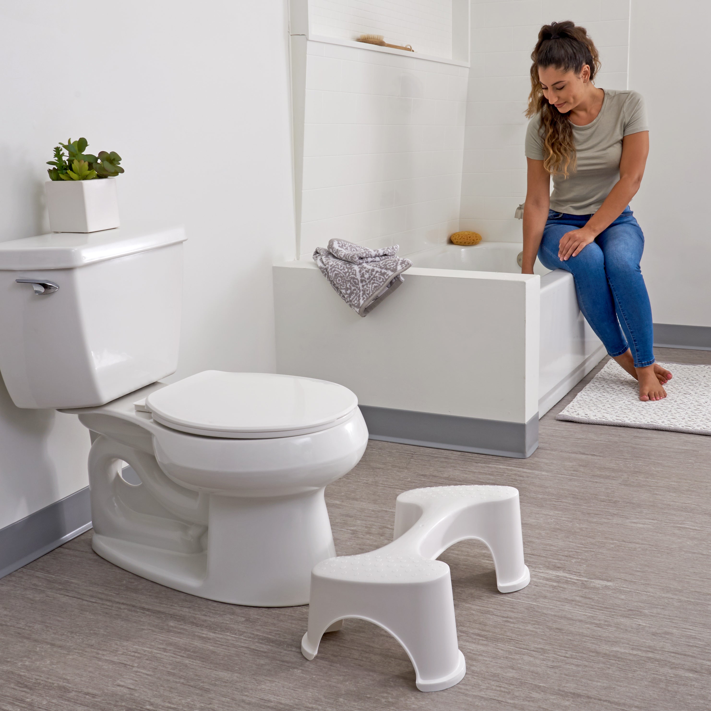 Toilet seat outlet stool